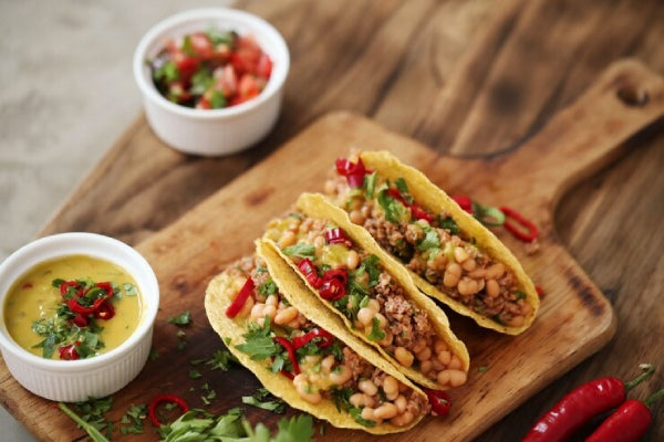 Mexican beans tacos with sour cream